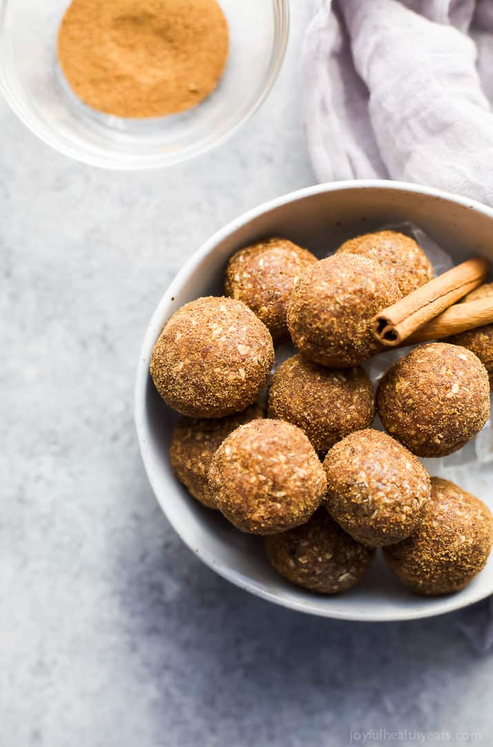 These easy Snickerdoodle Energy Balls are made in a blender and then rolled in a cinnamon coconut sugar crust. They taste just like snickerdoodle cookies and are the perfect breakfast, post workout snack or late night treat. #ad