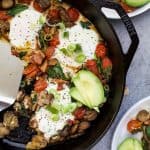 An easy gluten free Spinach Mushroom Breakfast Skillet that comes together in less than 30 minutes! This Breakfast Skillet is loaded with fiber and then topped with a runny egg and avocado. Perfect for brunch or dinner!