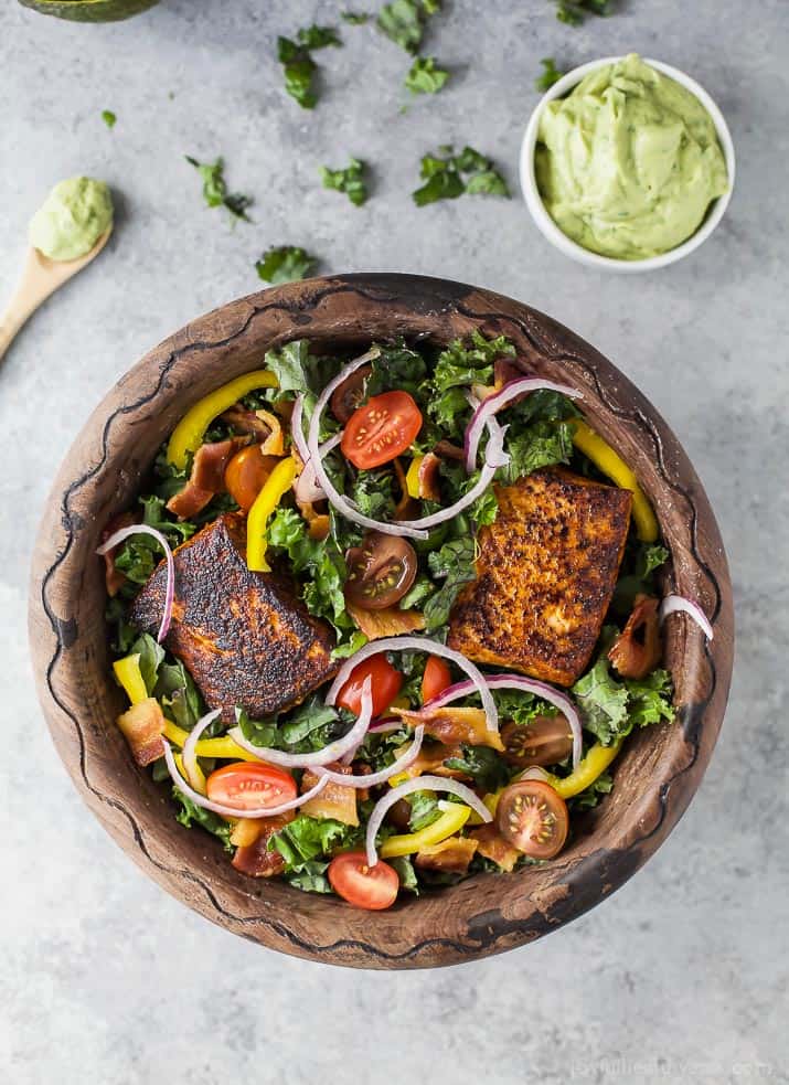 Top view of BLT Salmon Salad in a wooden bowl