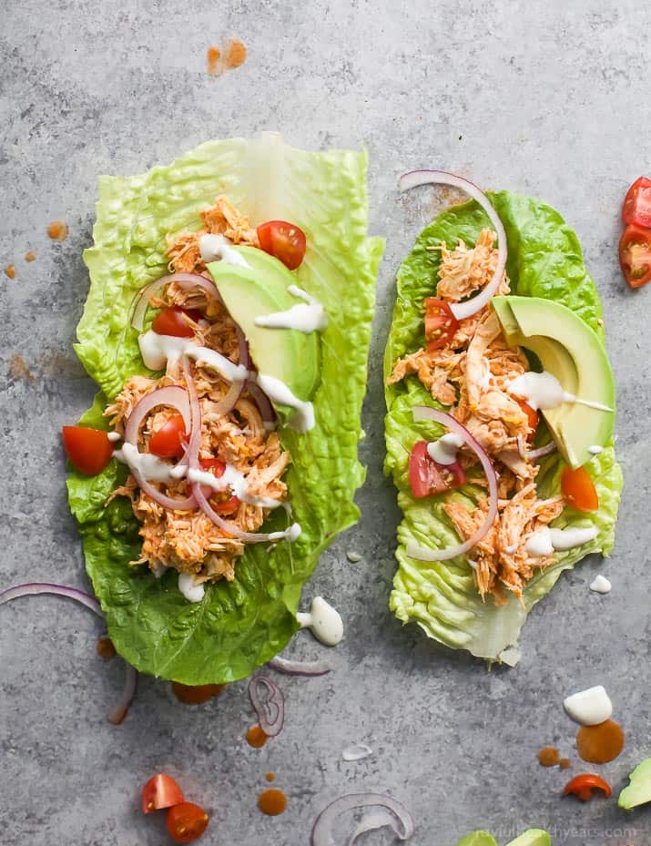 Buffalo Chicken Lettuce Wraps, a healthy low carb dinner recipe that's on the table in 15 minutes! These Lettuce Wraps are loaded with buffalo chicken flavor and topped with fresh veggies!