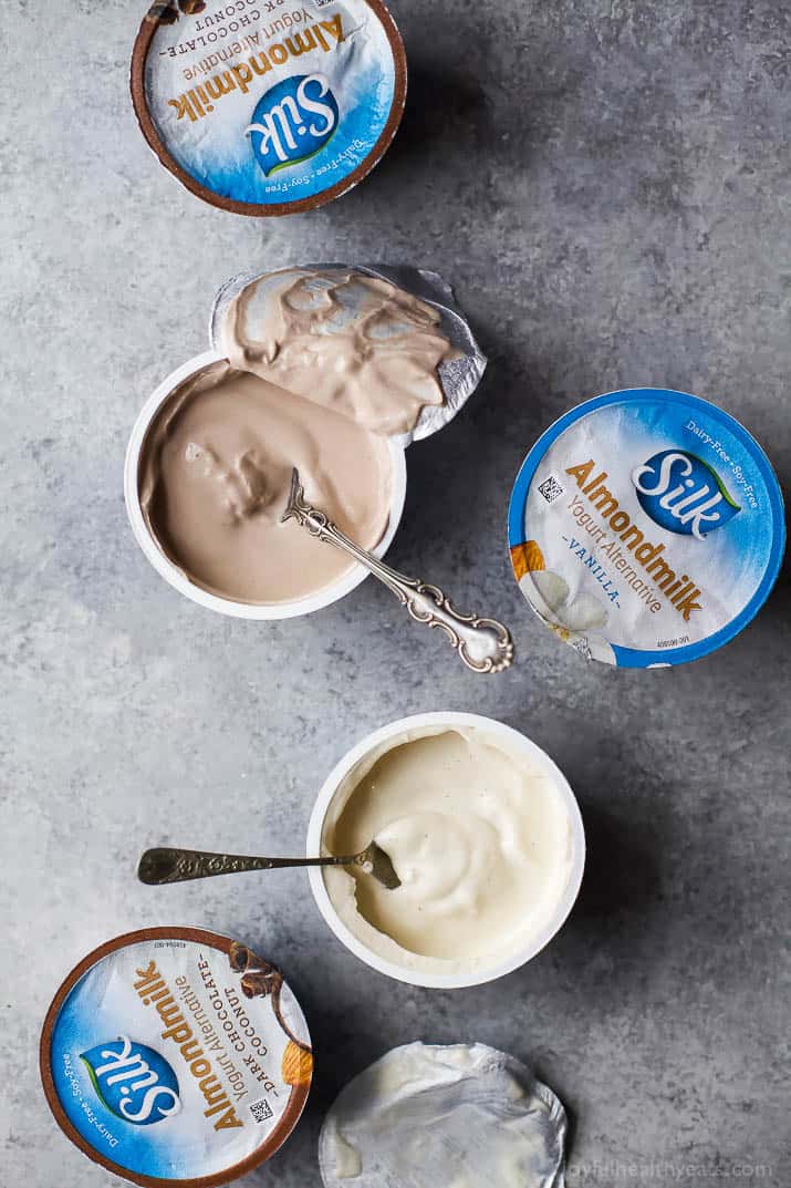 Top view of containers of vanilla and dark chocolate coconut Silk Almondmilk Yogurt