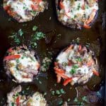 Easy Low Carb Philly Cheese Steak Stuffed Mushrooms filled with tender steak, sautéed vegetables and gooey cheese. These Stuffed Mushrooms are done in 30 minutes and loaded with flavor!