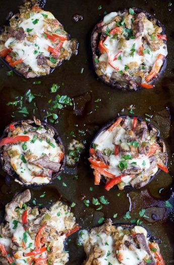 Easy Low Carb Philly Cheese Steak Stuffed Mushrooms filled with tender steak, sautéed vegetables and gooey cheese. These Stuffed Mushrooms are done in 30 minutes and loaded with flavor!