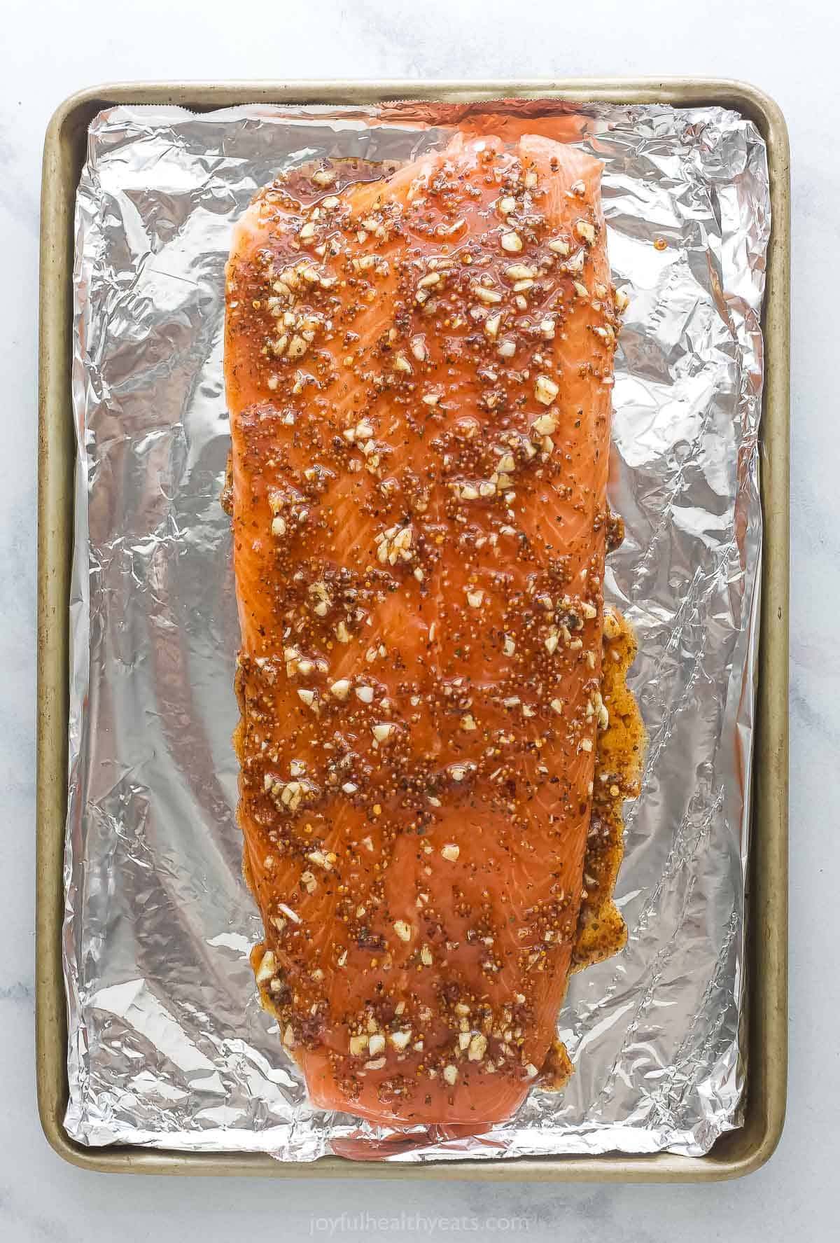 Salmon covered in honey mustard sauce. 