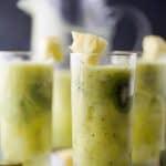 kiwi pineapple agua fresca in a cup with ice