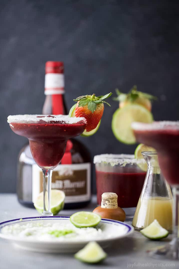 Fresh Berry Frozen Margaritas in a pitcher - loaded with sweet berries, agave, tequila, and fresh juices. It's the perfect party cocktail! These frozen margaritas are delicious, extremely smooth and fruity - guaranteed to be a crowd pleaser!