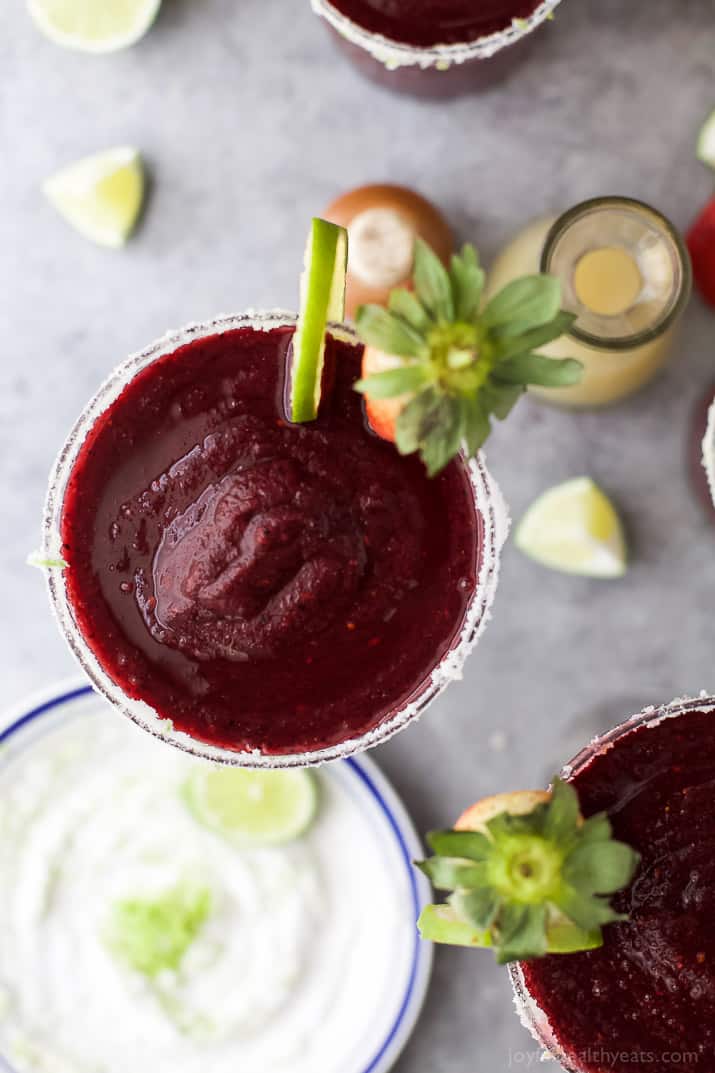 Fresh Berry Frozen Margaritas in a pitcher - loaded with sweet berries, agave, tequila, and fresh juices. It's the perfect party cocktail! These frozen margaritas are delicious, extremely smooth and fruity - guaranteed to be a crowd pleaser!