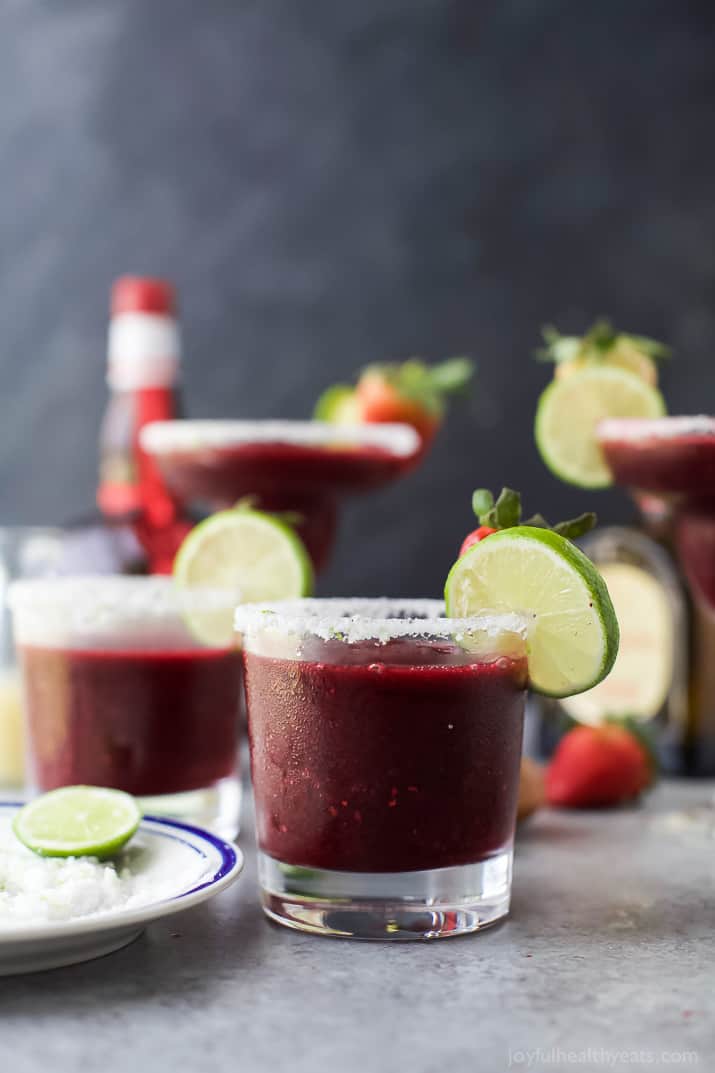 Fresh Berry Frozen Margaritas in a pitcher - loaded with sweet berries, agave, tequila, and fresh juices. It's the perfect party cocktail! These frozen margaritas are delicious, extremely smooth and fruity - guaranteed to be a crowd pleaser!