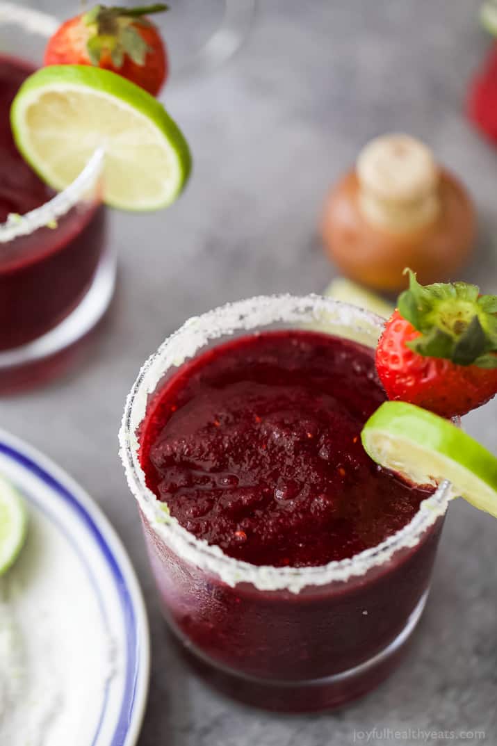 Fresh Berry Frozen Margaritas in a pitcher - loaded with sweet berries, agave, tequila, and fresh juices. It's the perfect party cocktail! These frozen margaritas are delicious, extremely smooth and fruity - guaranteed to be a crowd pleaser!
