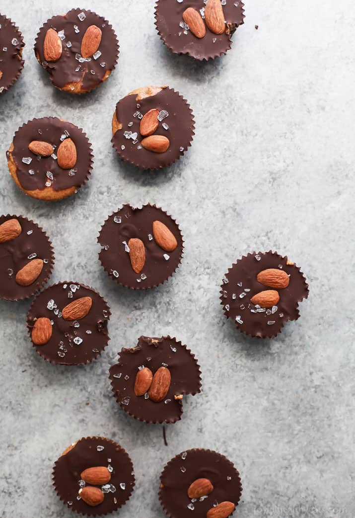 These 5 ingredient Vegan Almond Butter Cups are easy to make and a delicious healthy version of the popular candy! Creamy almond butter smooshed in between two layers of dark chocolate, can't get any better than that! 