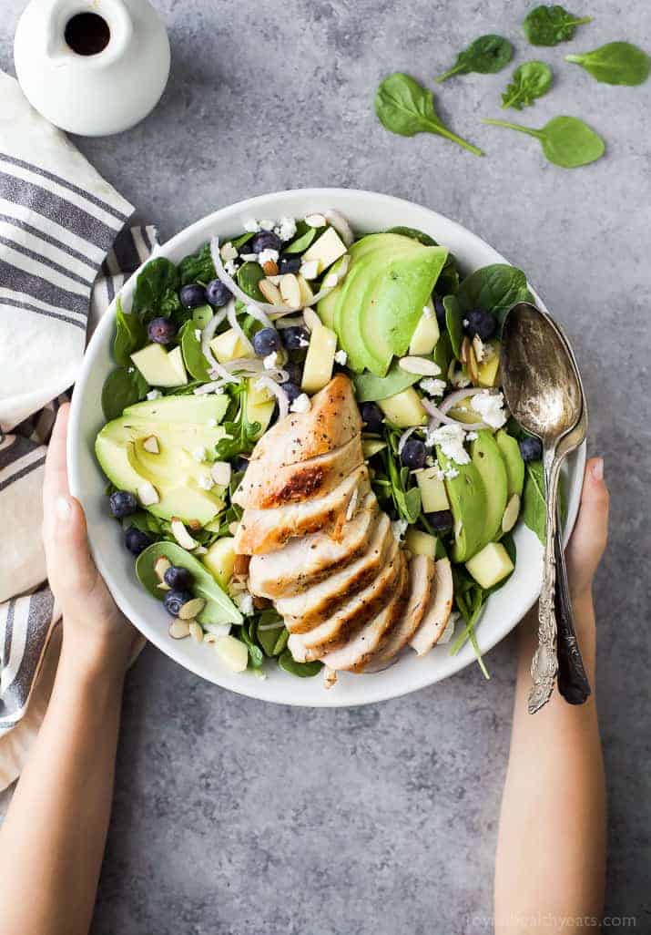 Top view of Grilled Avocado Mango Chicken Salad in a serving bowl