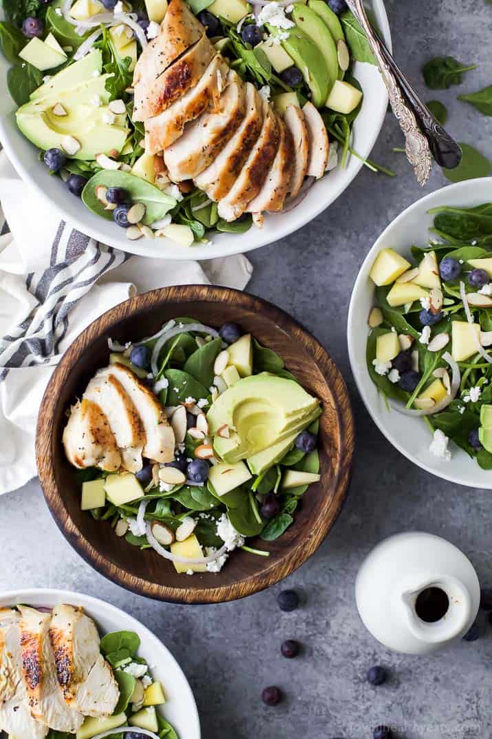Top view of Grilled Avocado Mango Chicken Salad in a bowl