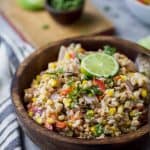 A delicious Farro Salad filled with Char Grilled Corn, Roasted Red Pepper and creamy goat cheese. Yup... it's incredible! It's the perfect side dish to bring to your next party or mid-week lunch.