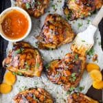 Sweet & Spicy CHIPOTLE APRICOT GRILLED CHICKEN THIGHS - juicy smoky chicken thighs slathered in an easy chipotle apricot glaze that will make you swoon! You'll be making this easy chicken recipe on repeat this summer.