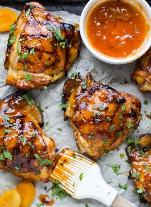 chipotle apricot glazed chicken thighs on a parchment paper