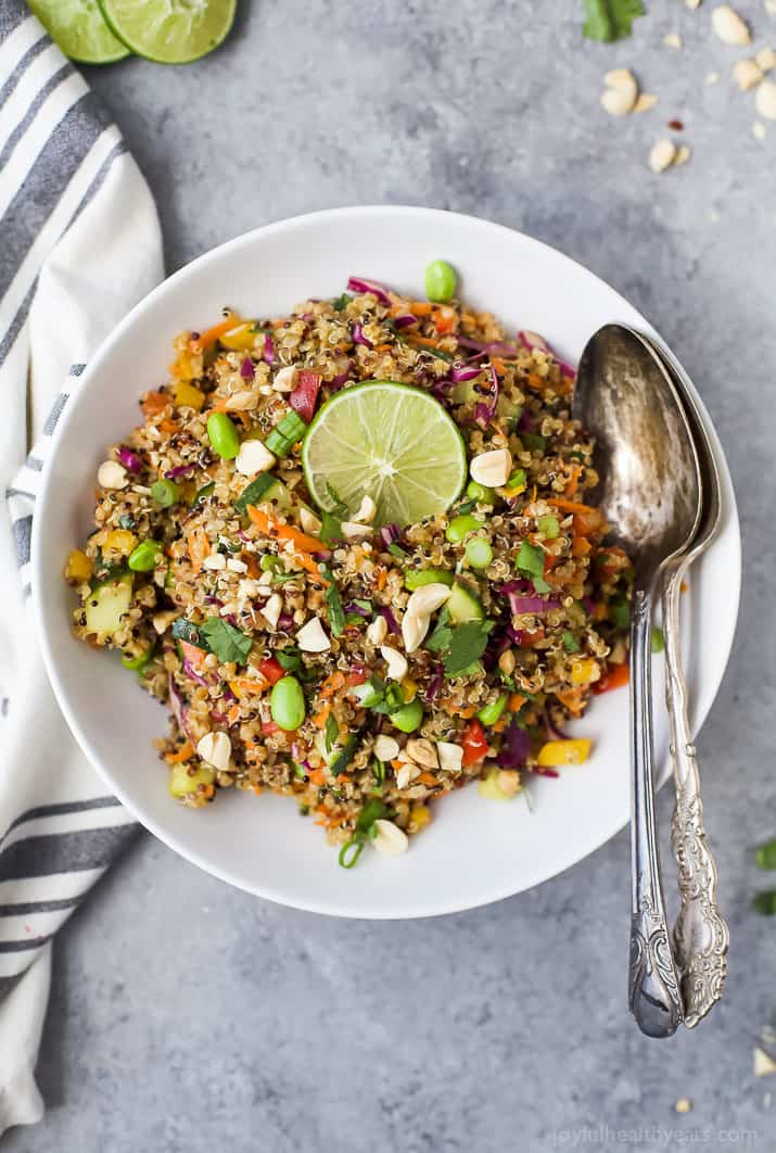 Top view of Crunchy Thai Quinoa Salad in a bowl with utensils
