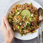 This Gluten Free Crunchy Thai Quinoa Salad is loaded with veggies then tossed with a Light Sesame Dressing. It's high in protein, fiber and flavor and guaranteed to become a favorite around your house! The perfect side to bring to that next party!