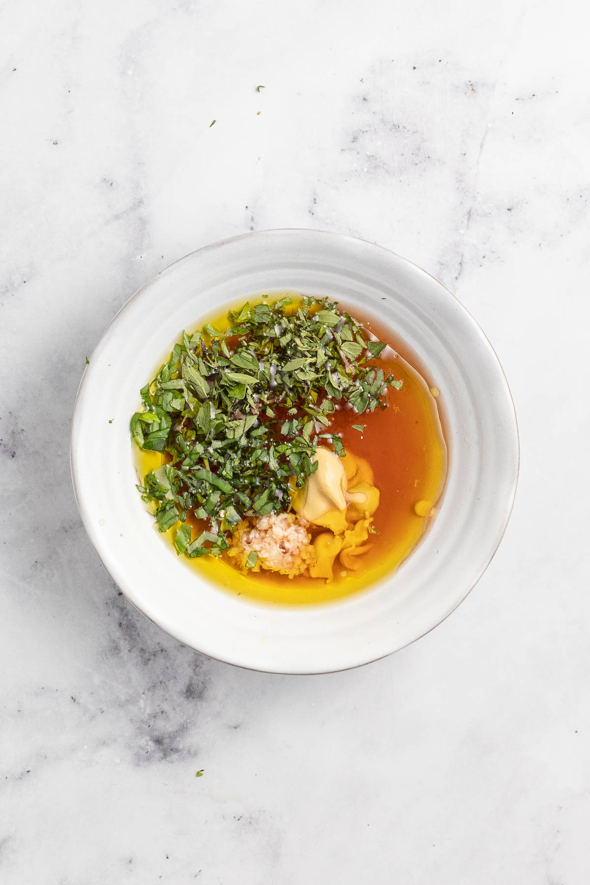 Dressing ingredients in a bowl. 