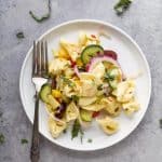 Easy 30 Minute Greek Tortellini Salad tossed with mediterranean veggies and a homemade greek vinaigrette for a lighter healthier taste. This Tortellini Pasta Salad is guaranteed to be the star at your summer BBQ's.