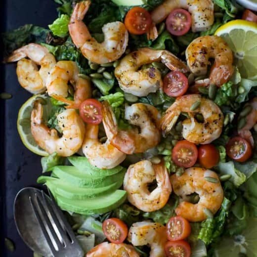 A quick 15 minute Grilled Shrimp Caesar Salad with a homemade egg and anchovy free caesar dressing! This Grilled Salad is light, refreshing and perfect for the summer!