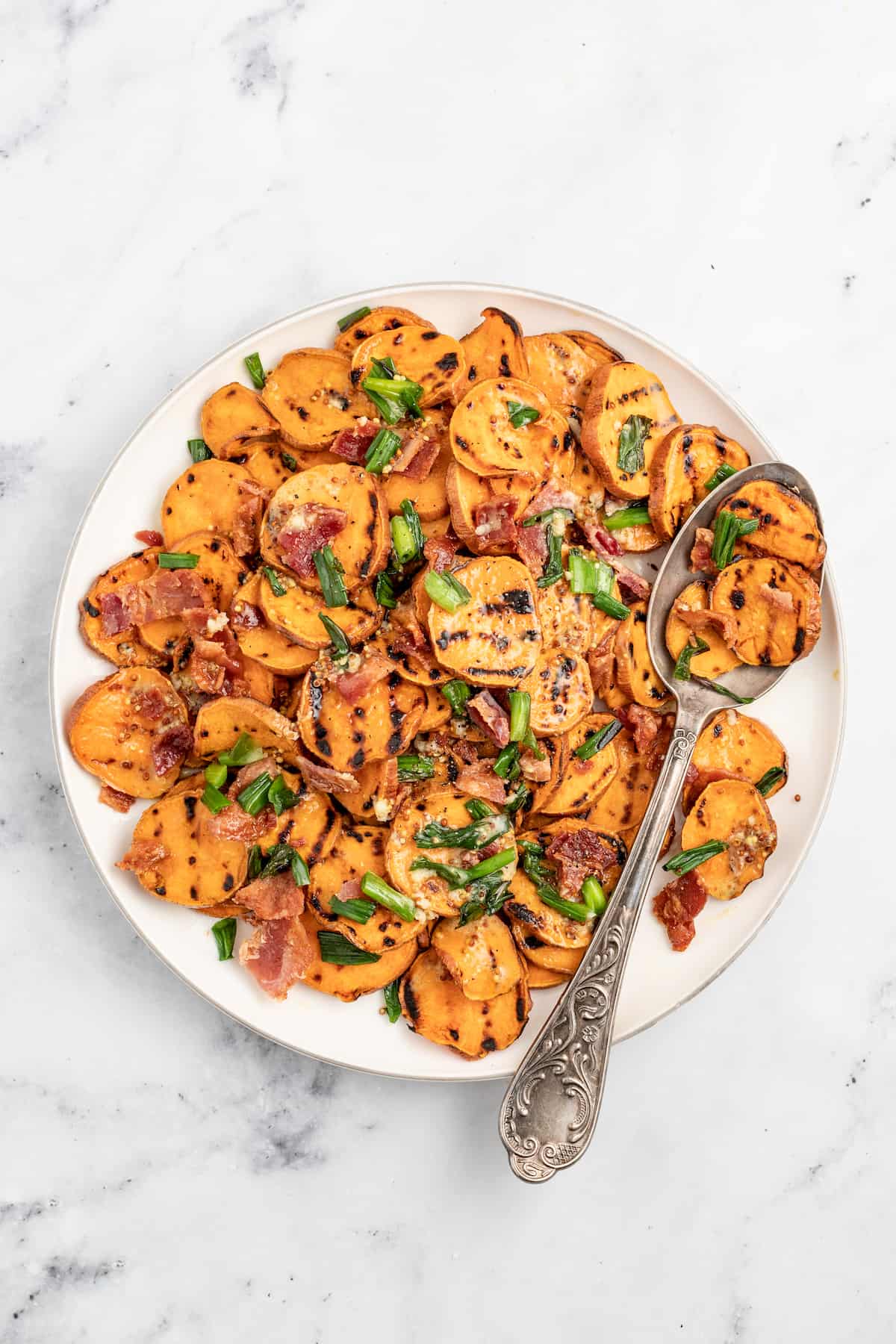 Grilled sweet potato salad on a plate. 