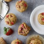 These Moist Healthy Strawberry Muffins are the perfect breakfast on the go! These muffins are dairy and refined sugar free and filled with fresh juicy strawberries and whole grains - only 128 calories a serving.