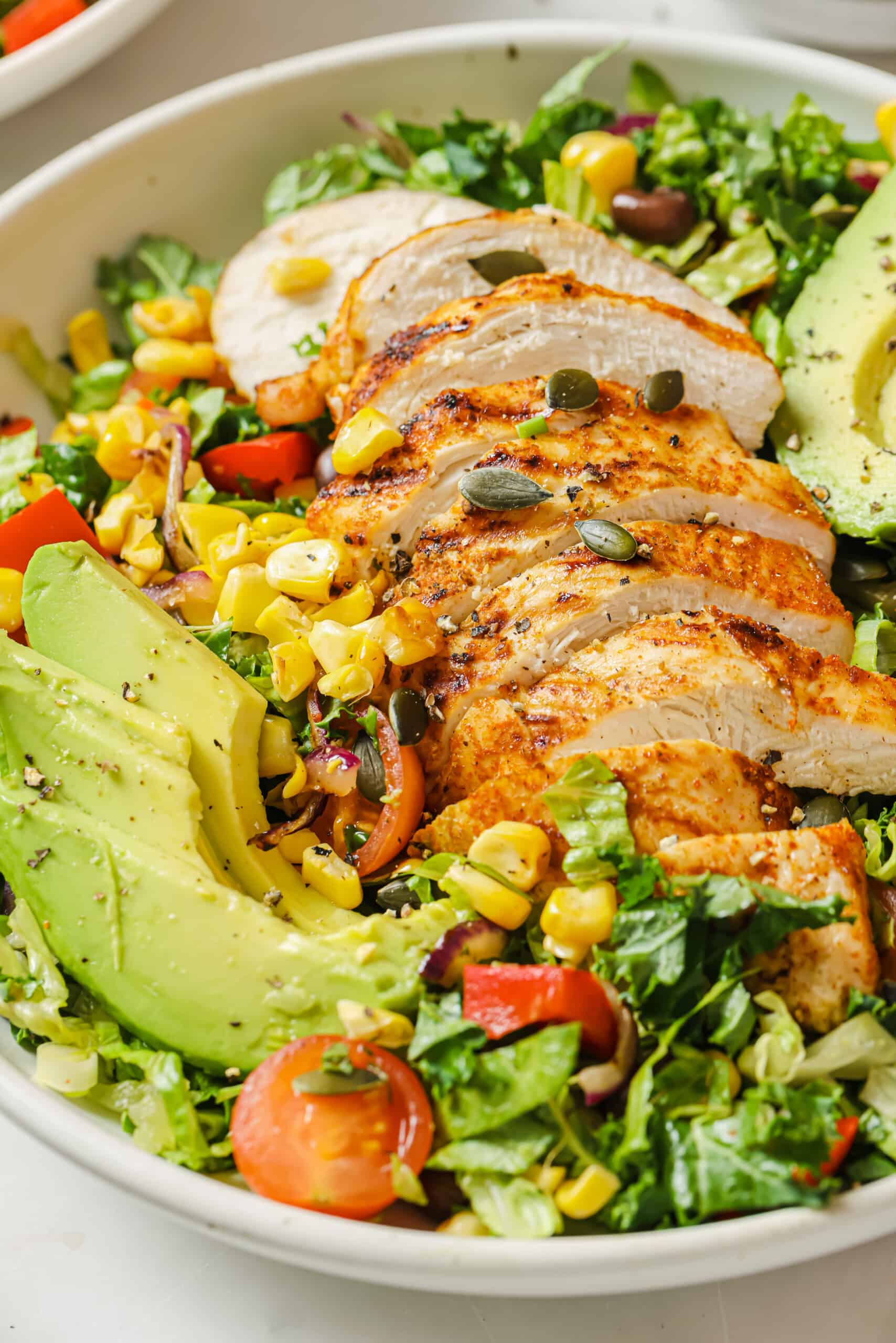 Close-up of sliced chicken in the Mexican chopped salad. 