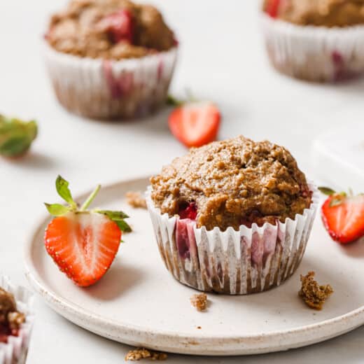 A strawberry muffin on a plate.