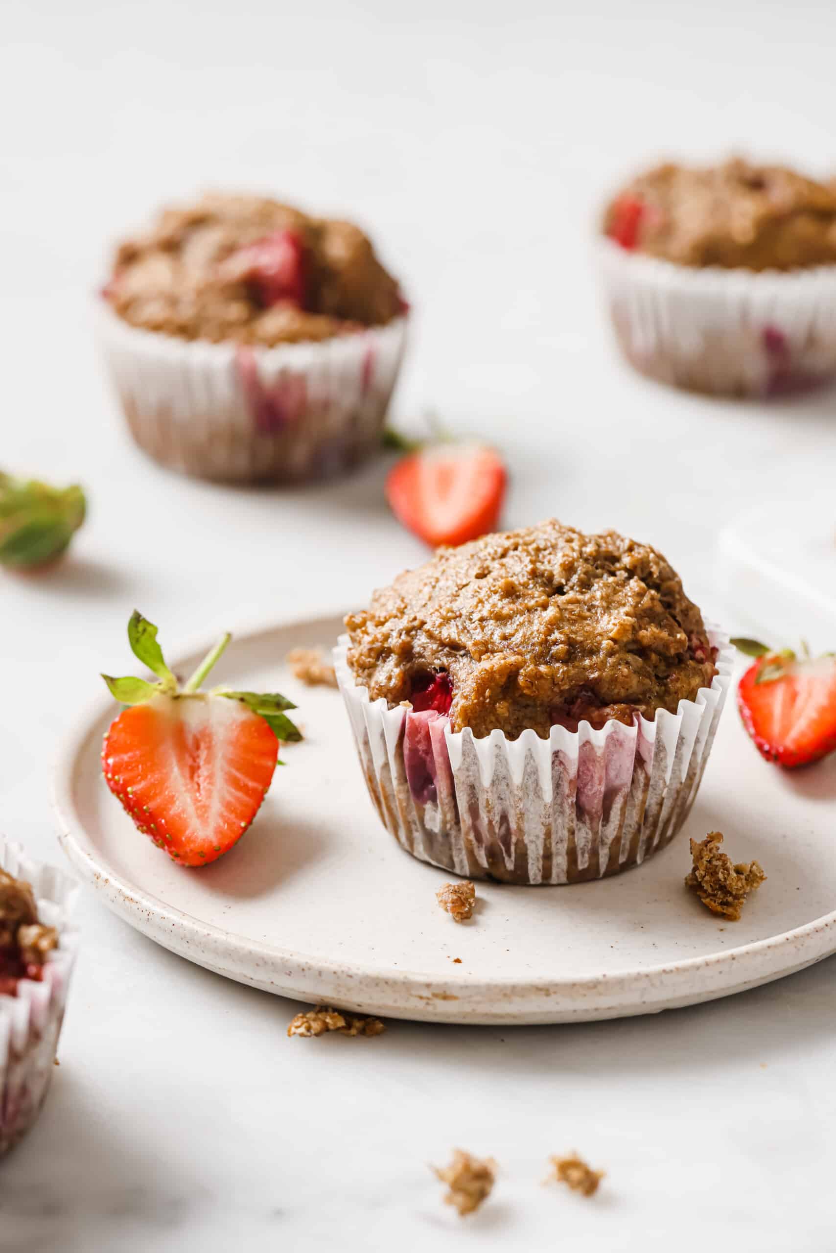 A strawberry muffin on a plate. 