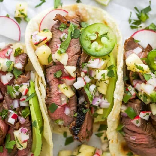 close up of marinated steak tacos