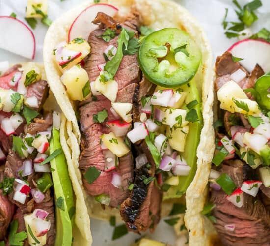 close up of marinated steak tacos