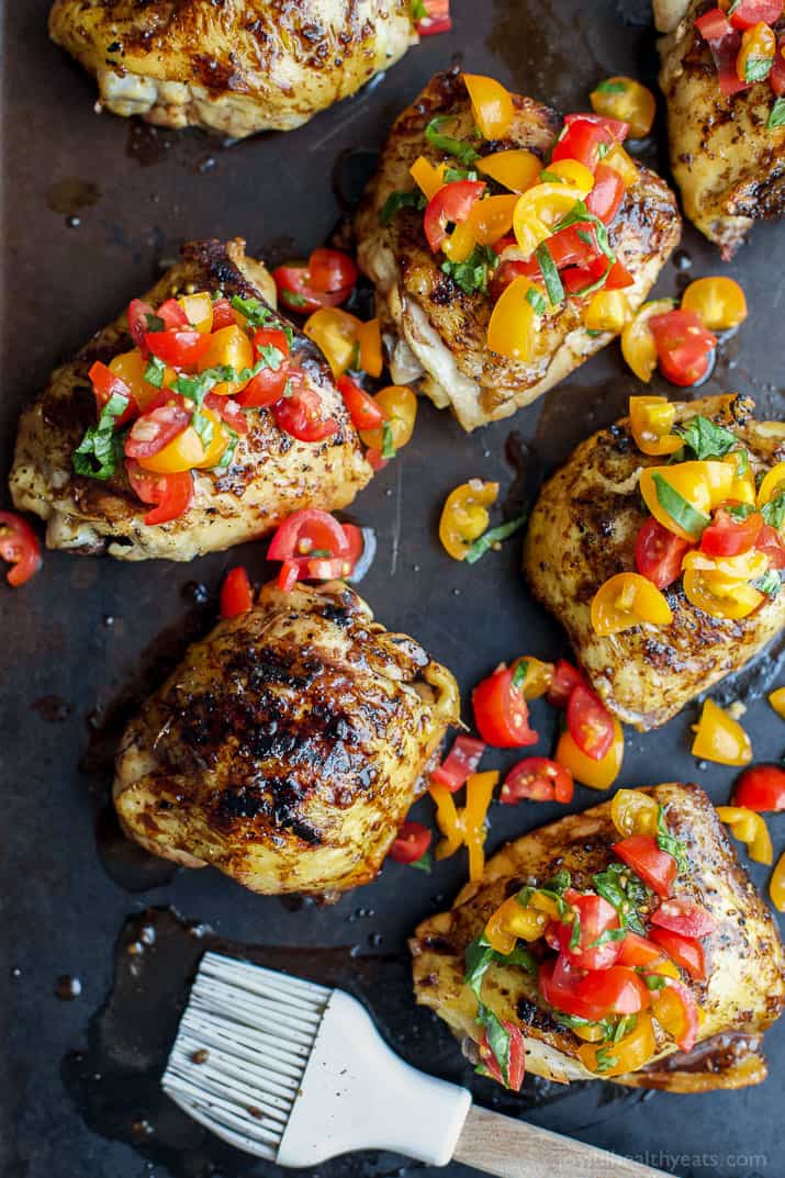 Balsamic Grilled Chicken Thighs topped with a fresh tomato Bruschetta