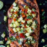 30 Minute Chili Lime Grilled Salmon topped with a fresh Pineapple Salsa! This light healthy recipe is paleo, gluten free and filled with flavor that screams summer!