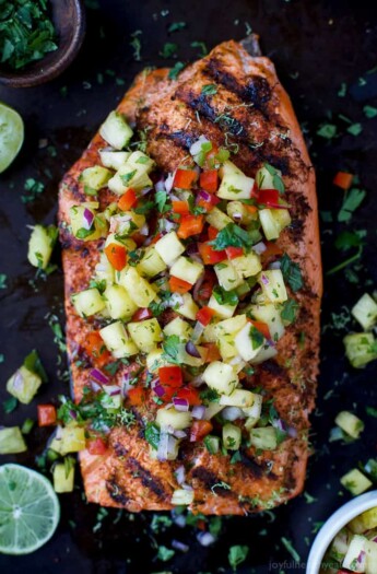30 Minute Chili Lime Grilled Salmon topped with a fresh Pineapple Salsa! This light healthy recipe is paleo, gluten free and filled with flavor that screams summer!