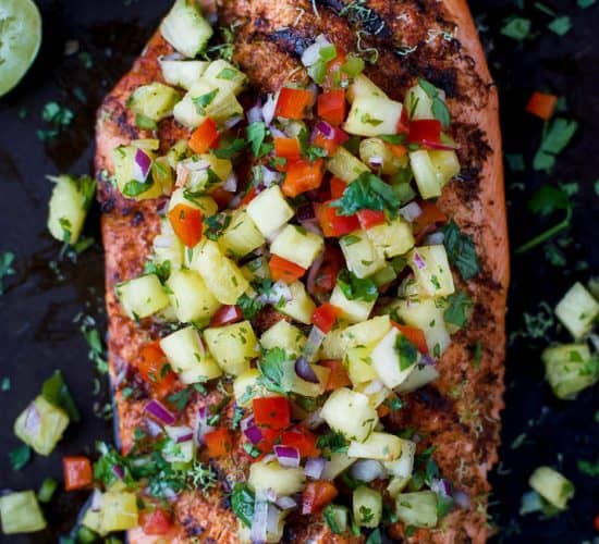 30 Minute Chili Lime Grilled Salmon topped with a fresh Pineapple Salsa! This light healthy recipe is paleo, gluten free and filled with flavor that screams summer!