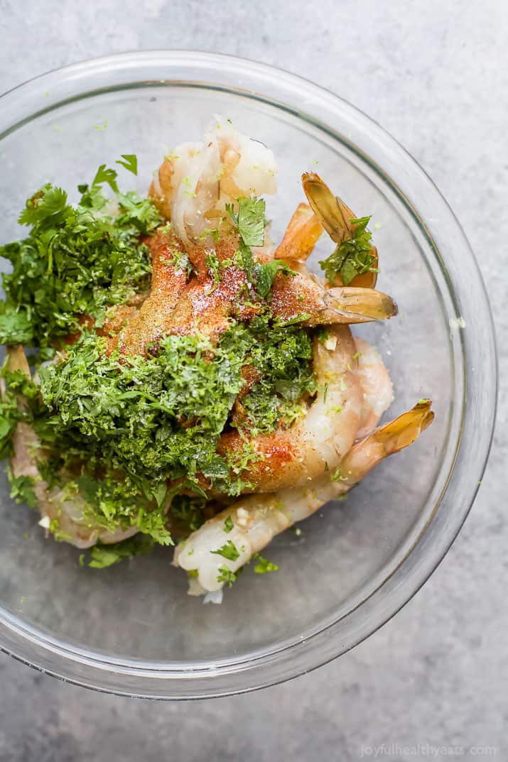 Ingredients for Grilled Cilantro Lime Shrimp in a mixing bowl