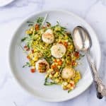 Seared Scallops with Corn Relish filled with pea sprouts, bacon and red pepper. An easy light recipe that screams summer with an easy "how to" to ensure you get perfectly seared scallops every time. #glutenfree