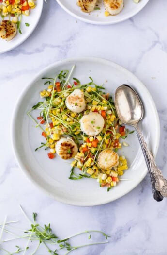 Seared Scallops with Corn Relish filled with pea sprouts, bacon and red pepper. An easy light recipe that screams summer with an easy "how to" to ensure you get perfectly seared scallops every time. #glutenfree