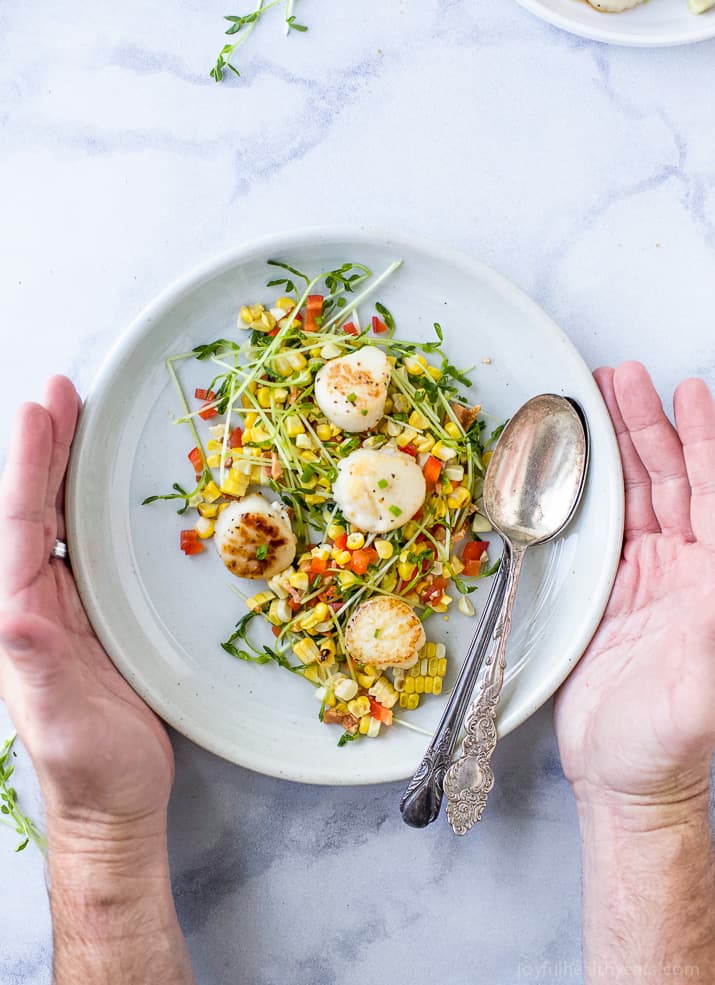 Seared Scallops with Corn Relish filled with pea sprouts, bacon and red pepper. An easy light recipe that screams summer with an easy "how to" to ensure you get perfectly seared scallops every time. #glutenfree