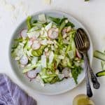 Shaved Zucchini Asparagus Salad loaded with raw greens, radishes, almonds & parmesan then tossed with a Lemon Vinaigrette. This light summer salad focuses on real ingredients and bringing out complex flavors!