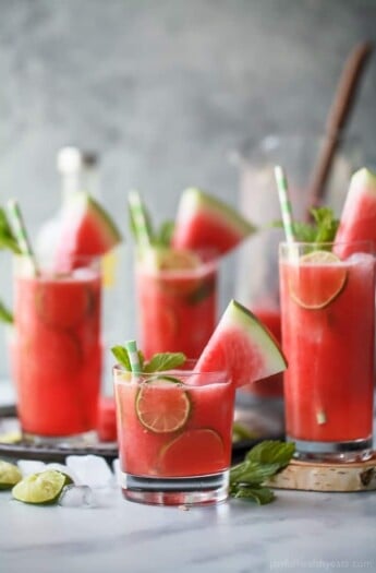 Vodka Watermelon Cocktail the perfect refreshing drink to sip on this summer! Easy, light and made with 4 ingredients you're gonna love this party cocktail! Only 136 calories a serving!