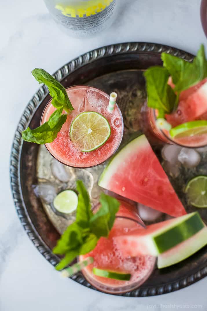 Vodka Watermelon Cocktail the perfect refreshing drink to sip on this summer! Easy, light and made with 4 ingredients you're gonna love this party cocktail! Only 136 calories a serving!