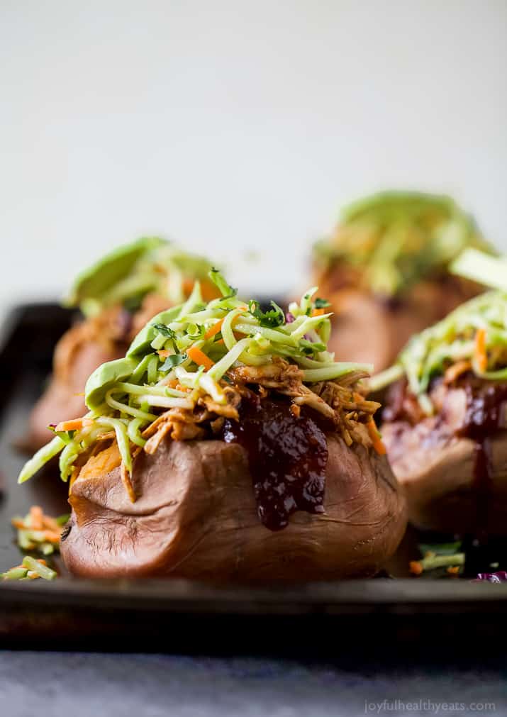 BBQ Chicken Stuffed Sweet Potatoes topped with Broccoli Slaw