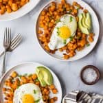 30 Minute Paleo Sweet Potato Hash & Eggs with bacon and avocado. A quick easy breakfast hash that's under 350 calories and so delicious you'll want to devour it!