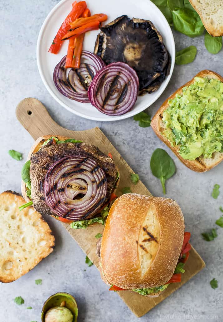Grilled Portobello Burgers with a zesty Avocado Chimichurri is one perfect way to amp up Meatless Monday. This easy 30 minute burger will be a hit this summer! 