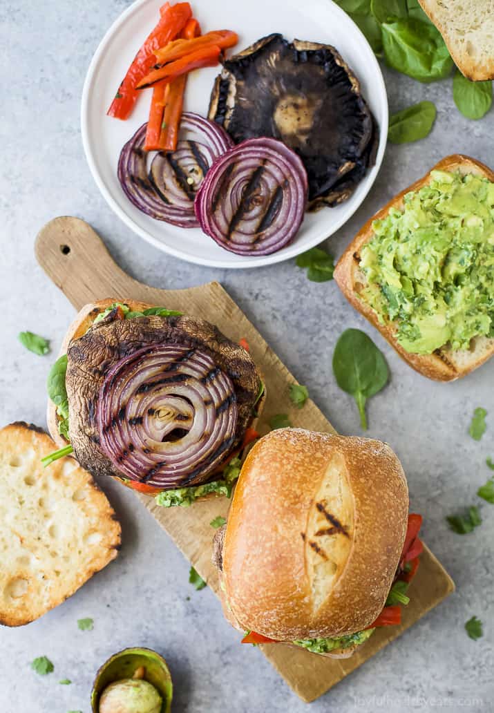 Grilled Portobello Burgers with a zesty Avocado Chimichurri is one perfect way to amp up Meatless Monday. This easy 30 minute burger will be a hit this summer!