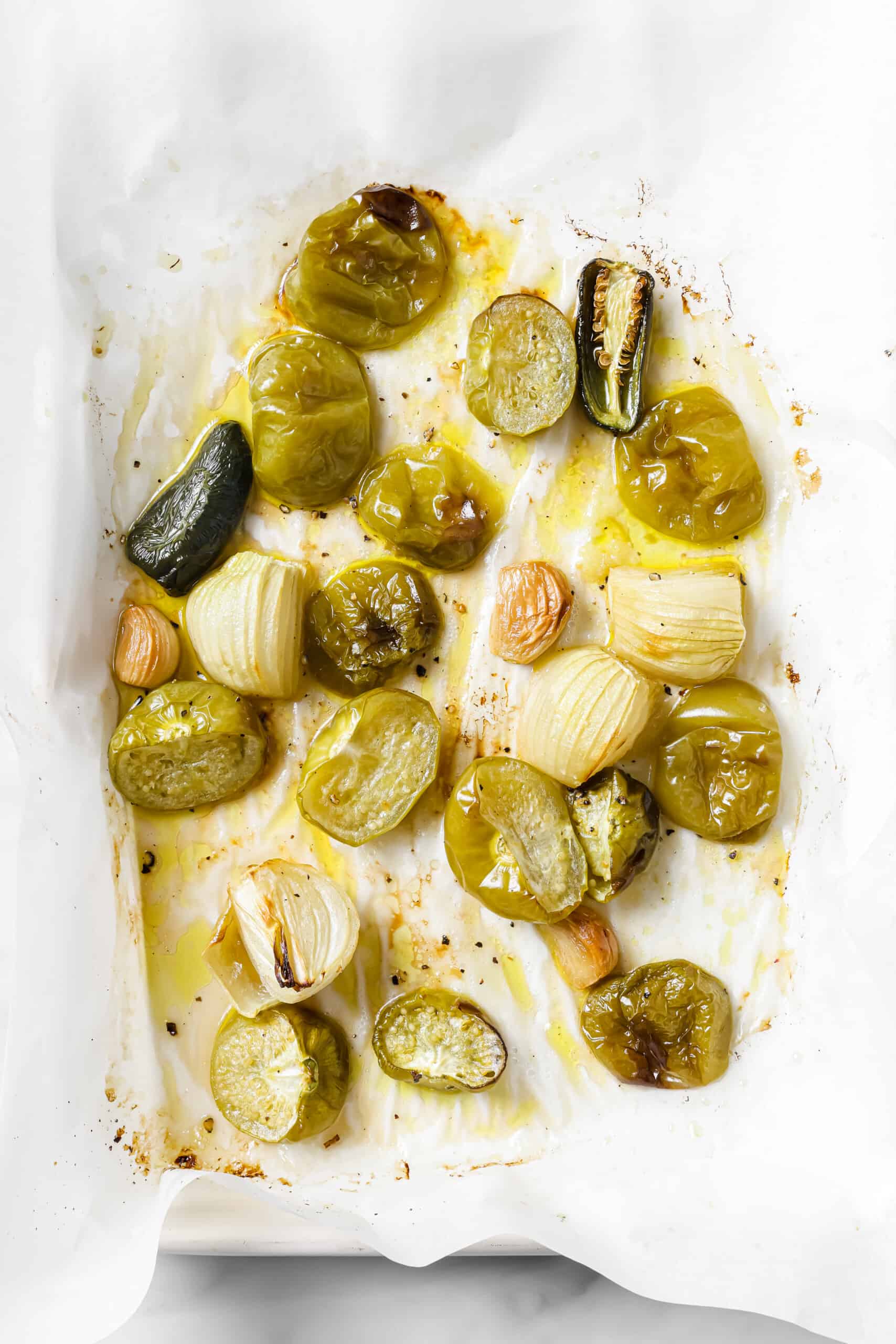 Charred veggies in the baking sheet.