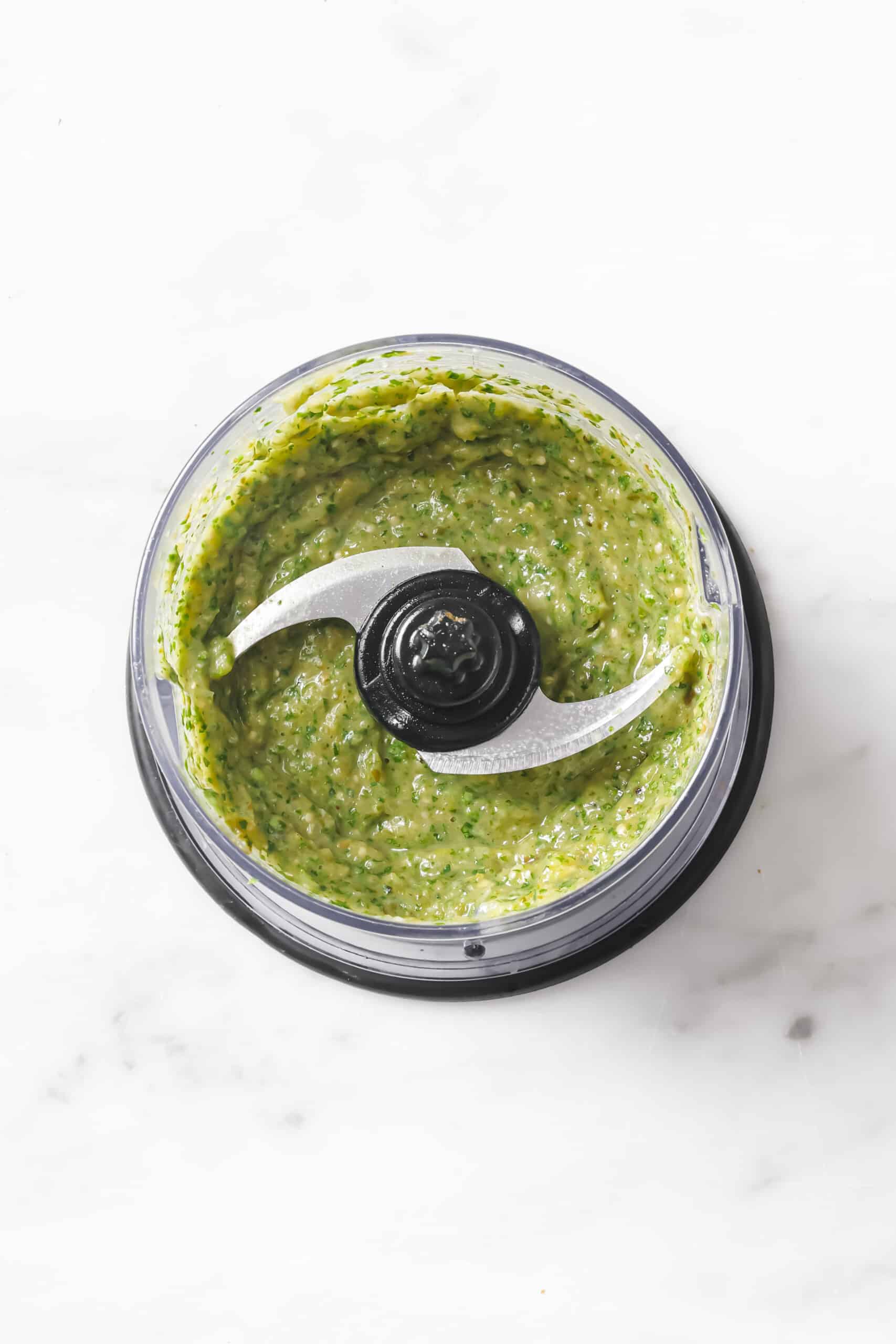This easy carne asada recipe with salsa verde will be your new favorite Mexican dinner. Easy to make and super juicy, it's the perfect dish! Blended sauce in the food processor.