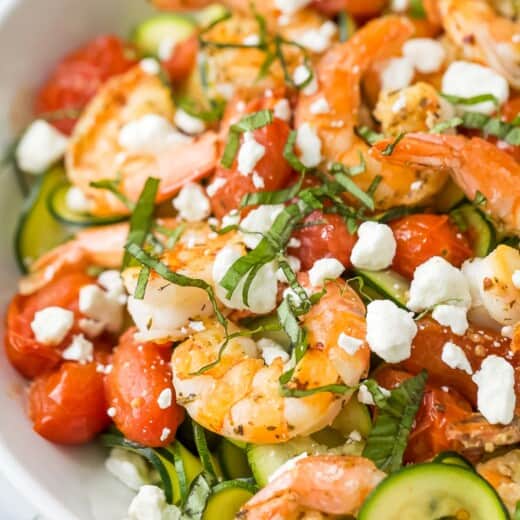 Close-up of zoodle pasta with veggies.