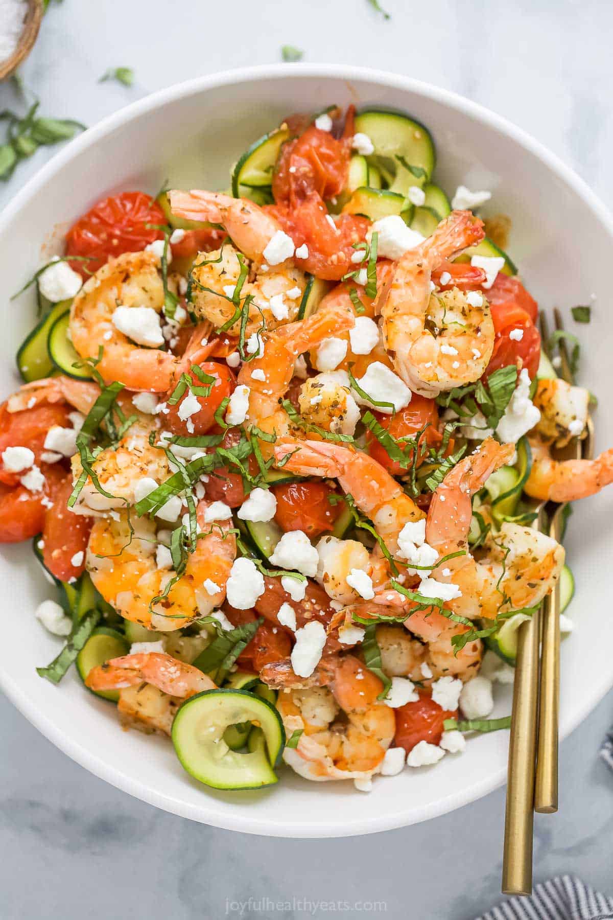 Bowl of creamy shrimp pasta with zoodles. 